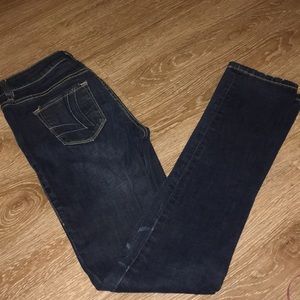 Dark wash skinny jeans. Size 4.